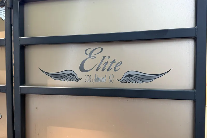 Slide: The Image of 2019 Bentley Pontoons 250/253 Elite Admiral logo with wing design on boat panel. - 14