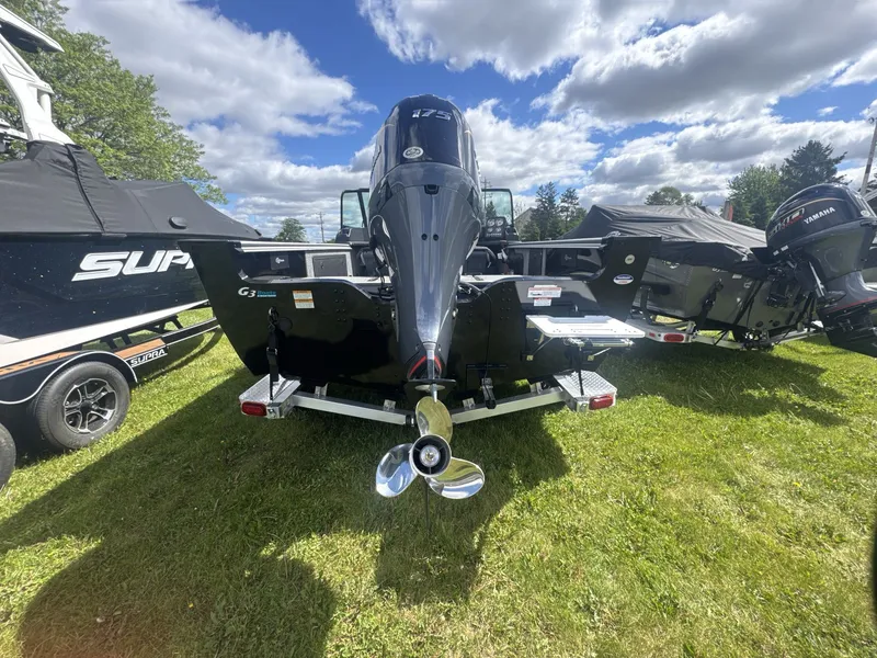 Slide: The Image of 2026 G3 Angler V1850 SF boat displayed on grass. - 10