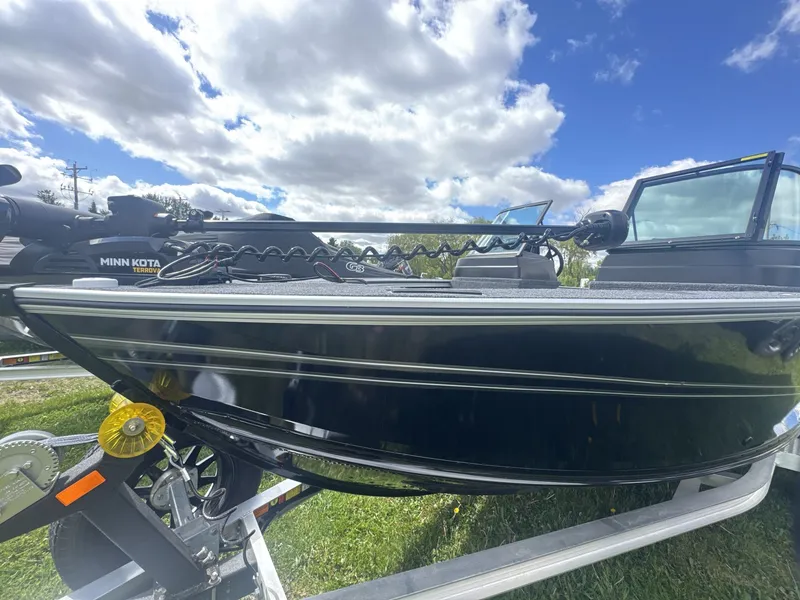 Slide: The Image of 2026 G3 Angler V1850 SF boat on trailer, blue sky. - 3