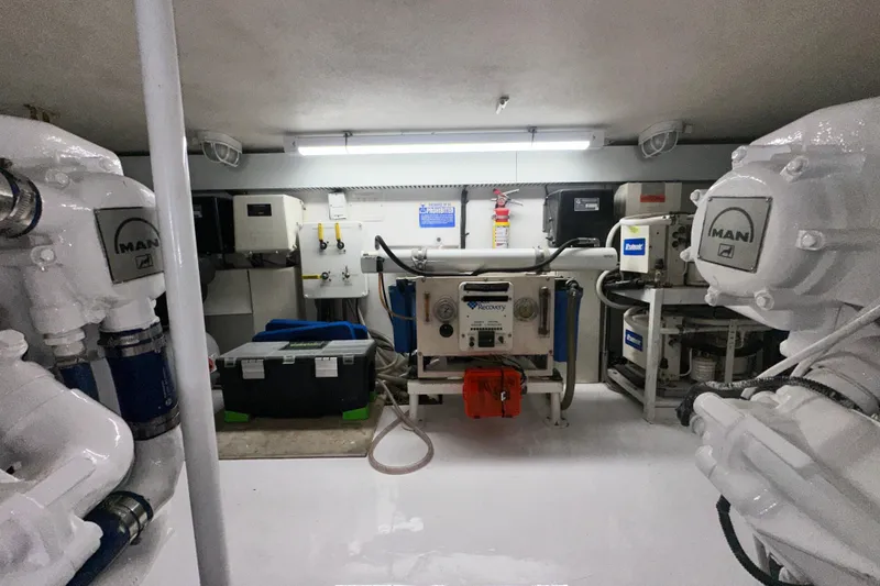 Slide: The Image of Engine room of a 1997 Viking 58 Convertible yacht with MAN engines and equipment. - 160