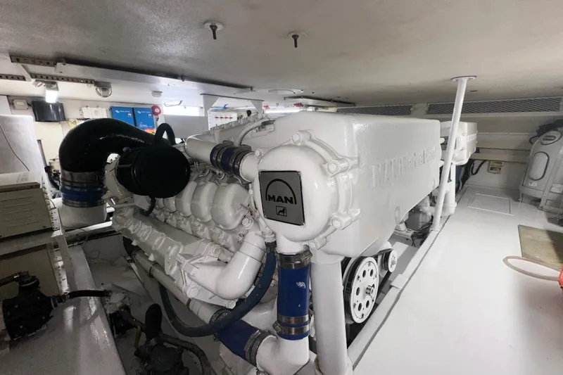 Slide: The Image of Engine room of a 1997 Viking 58 Convertible yacht with MAN engine. - 164