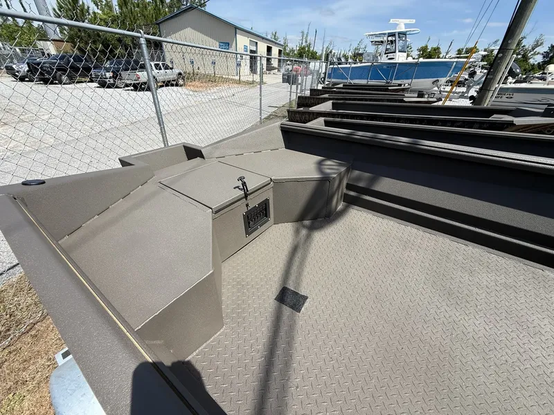 Slide: The Image of Reaper Boats 553 from 2026, sturdy design, displayed in a parking lot. - 4