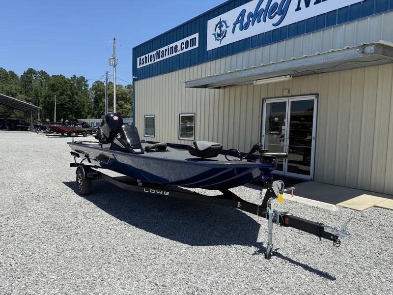 Slide: The Image of Lowe Stinger 195 Bass 2026 outside Ashley Marine building. - 2