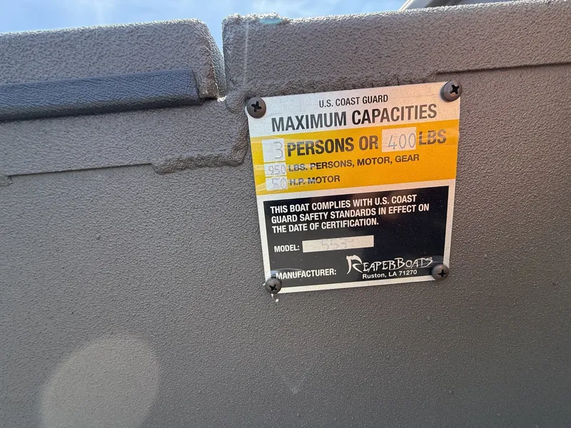 Slide: The Image of US Coast Guard capacity label on Reaper Boats 553, year 2026. - 3