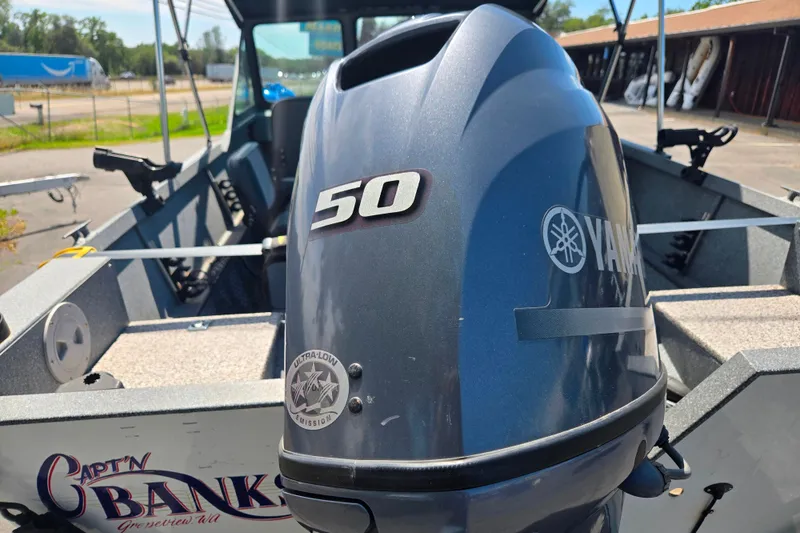 Slide: The Image of 2016 Alumaweld Talon 16 boat with Yamaha 50 outboard motor, parked outdoors. - 3
