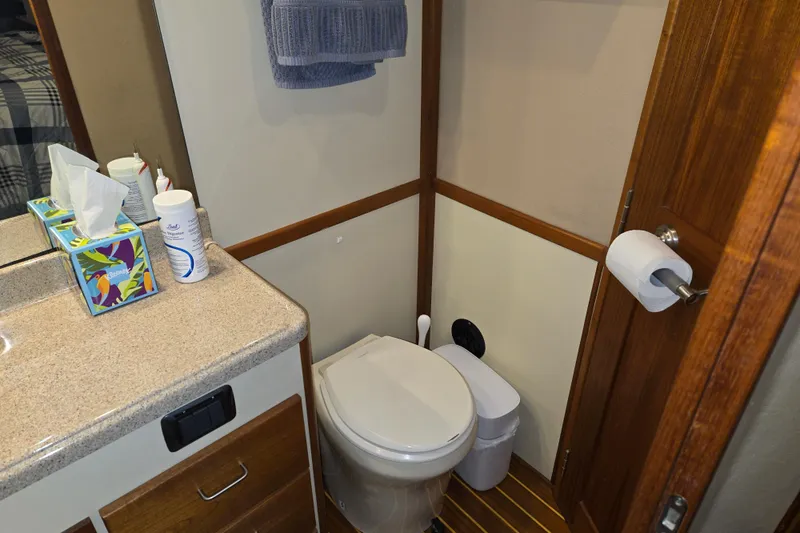 Slide: The Image of Bathroom interior of 2006 American Tug 34 Pilothouse Trawler with toilet and sink. - 18