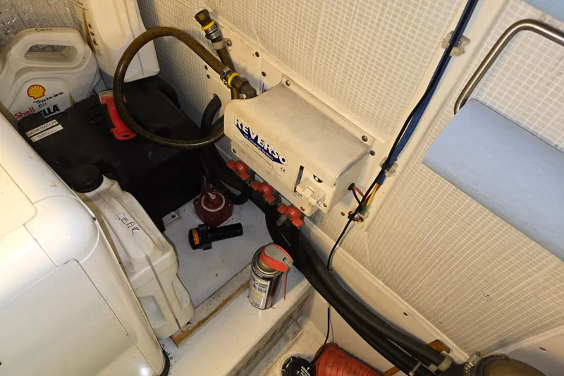 Slide: The Image of Engine room of 2006 American Tug 34 Pilothouse Trawler with equipment and supplies. - 41