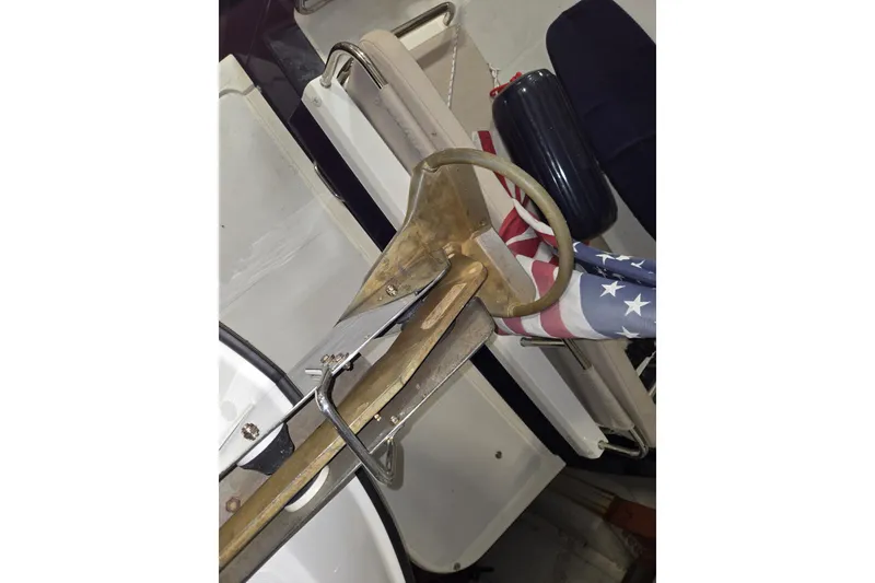 Slide: The Image of Anchor and American flag on 2006 American Tug 34 Pilothouse Trawler. - 49