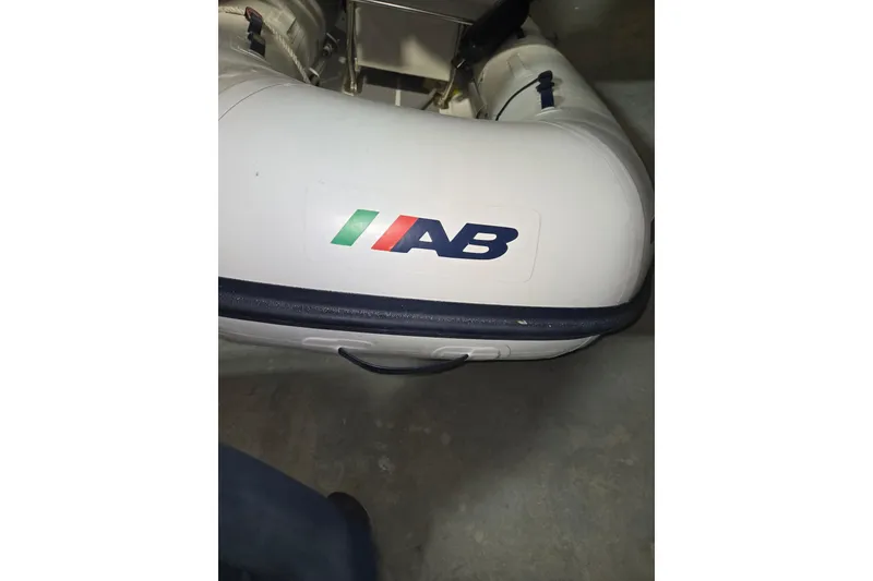 Slide: The Image of Inflatable boat with AB logo, associated with 2006 American Tug 34 Pilothouse Trawler. - 53