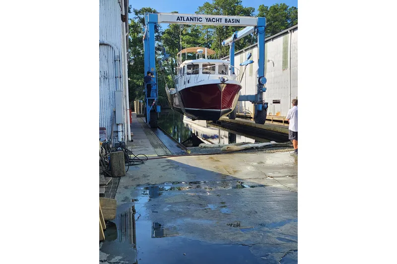 Slide: The Image of American Tug 34 Pilothouse Trawler, 2006, lifted at Atlantic Yacht Basin. - 62