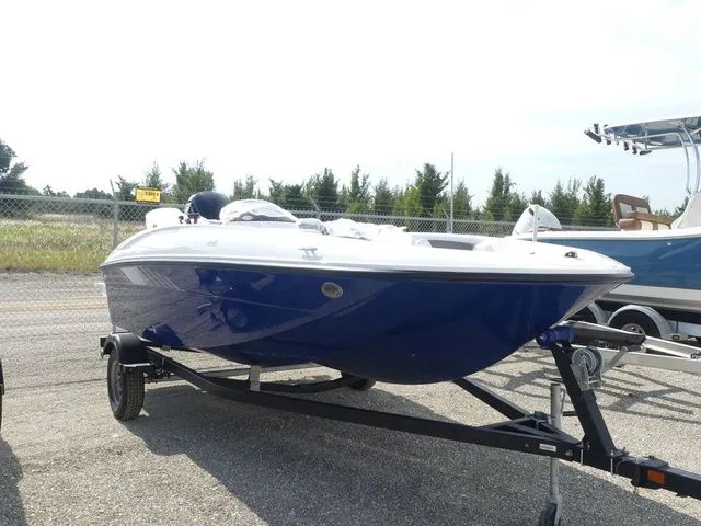Slide: The Image of 2026 Bayliner Element E16 boat on trailer, blue and white. - 3
