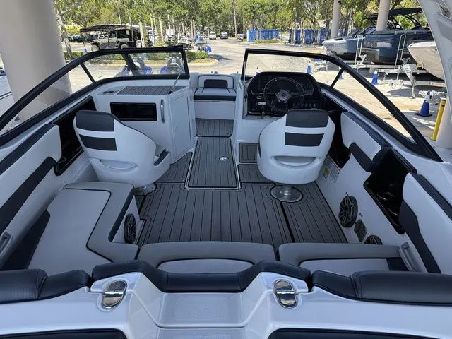 Slide: The Image of Interior of a 2023 Yamaha Boats 195S with modern seating. - 30