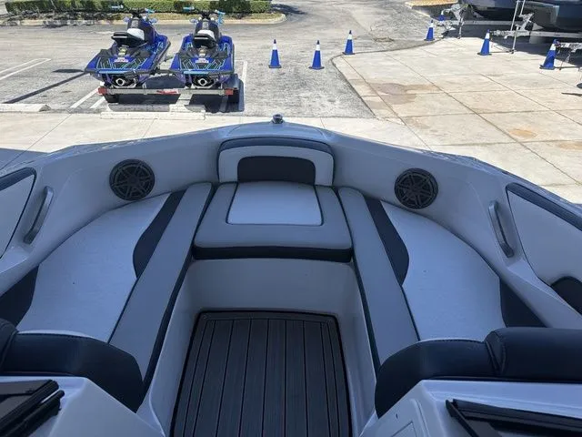 Slide: The Image of Interior of a 2023 Yamaha Boats 195S with stylish seating area. - 31