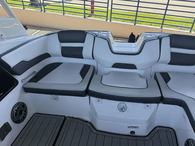Slide: The Image of Interior of 2023 Yamaha Boats 195S with gray and black seating. - 42