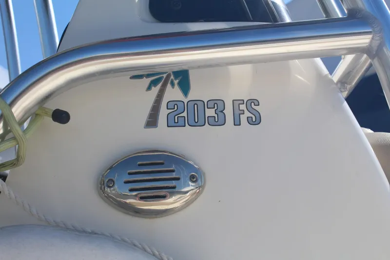 Slide: The Image of 2017 Key West 203 FS boat detail with logo and metal fixture. - 2