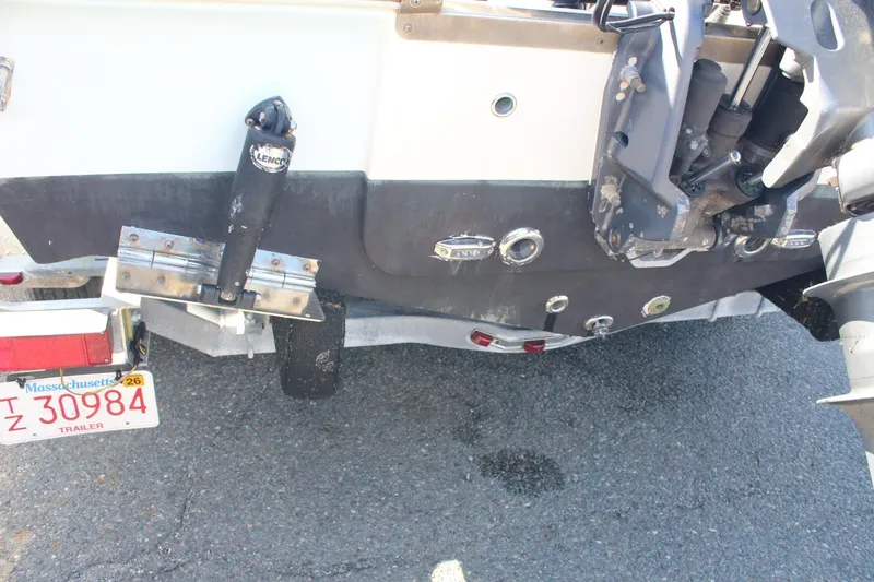 Slide: The Image of Rear view of a 2017 Key West 203 FS boat with Massachusetts trailer plate. - 4