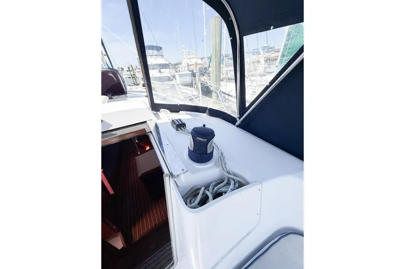 Slide: The Image of Cockpit view of a 2005 Hunter 36 sailboat with winch and ropes. - 19