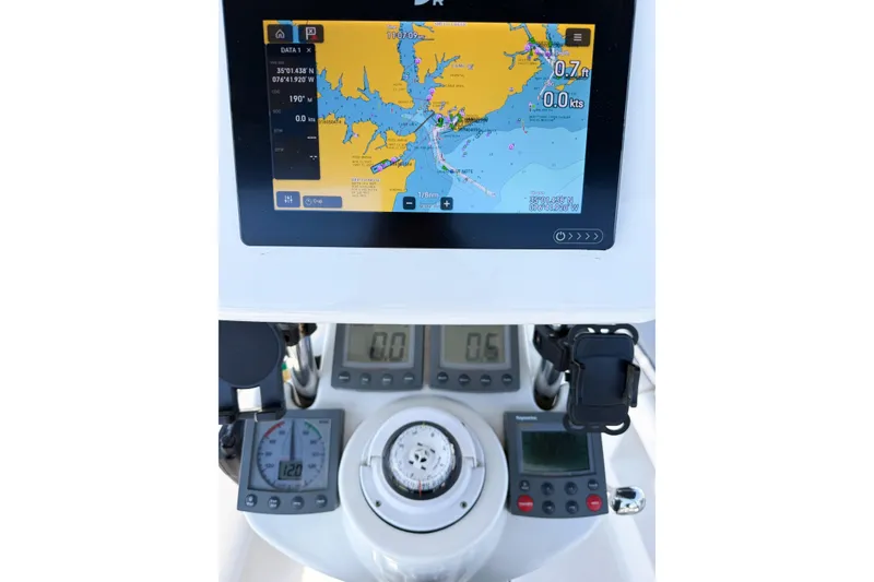 Slide: The Image of Navigation system and controls on a 2005 Hunter 36 sailboat. - 23