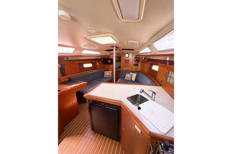 Slide: The Image of Interior of 2005 Hunter 36 sailboat with cozy seating and modern amenities. - 50