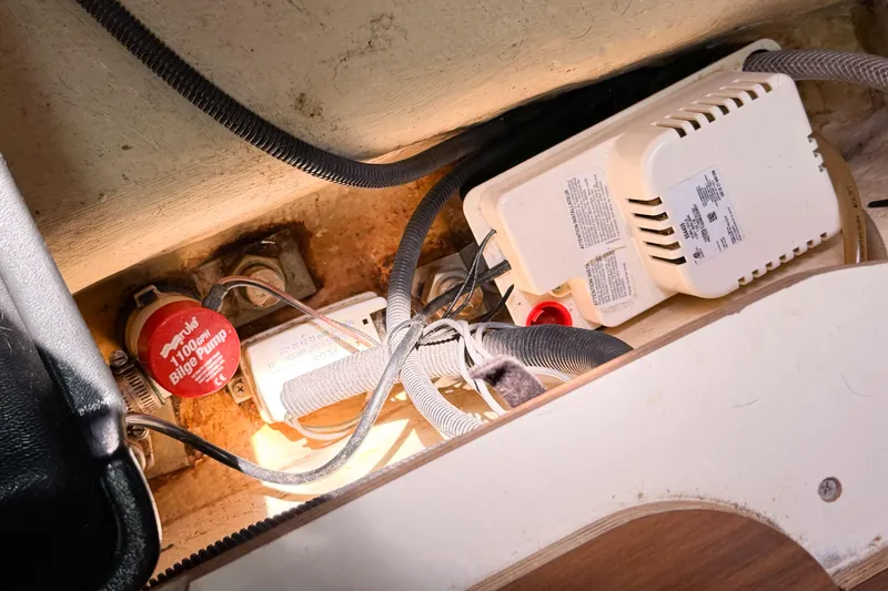 Slide: The Image of Bilge pump and wiring inside a 2005 Hunter 36 sailboat. - 69