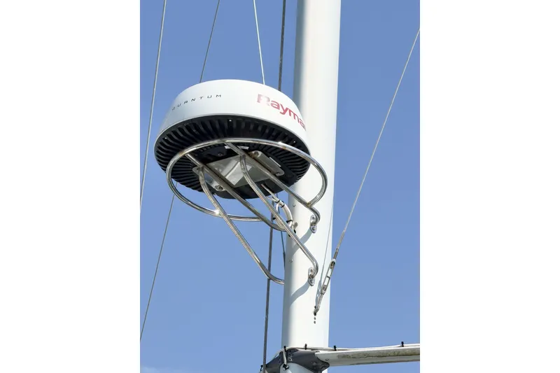 Slide: The Image of Radar equipment on a 2005 Hunter 36 sailboat mast against a clear blue sky. - 81