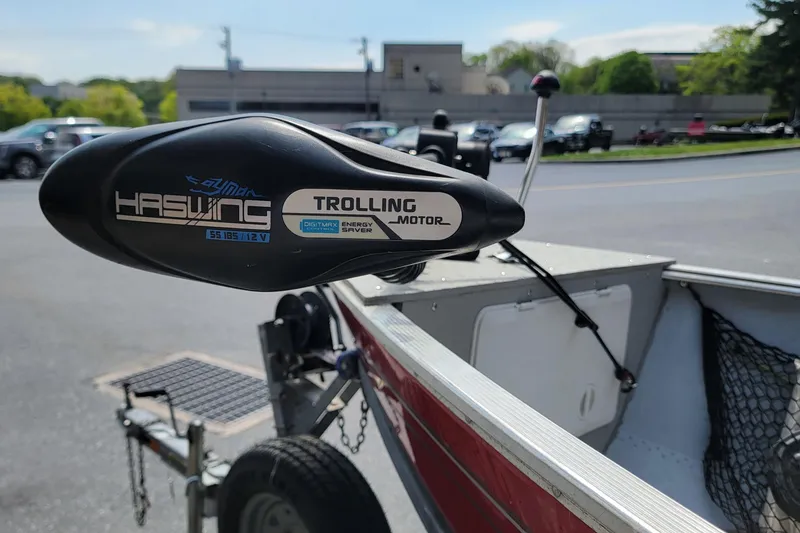 Slide: The Image of Trolling motor on 2006 Lund 2000 Alaskan SS boat, parked outdoors. - 8