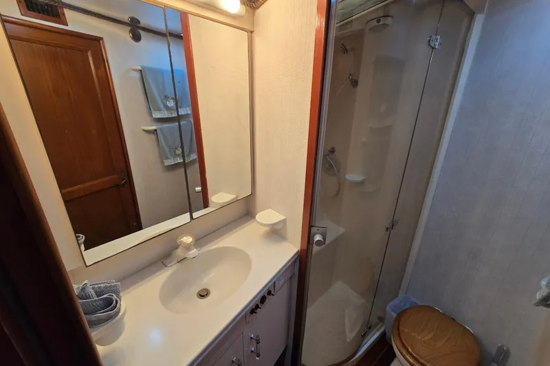 Slide: The Image of Bathroom interior of 1993 Ocean Yachts 53 Super Sport with shower and vanity. - 24