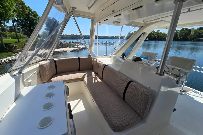 Slide: The Image of Luxurious 1993 Ocean Yachts 53 Super Sport interior with scenic waterfront view. - 34