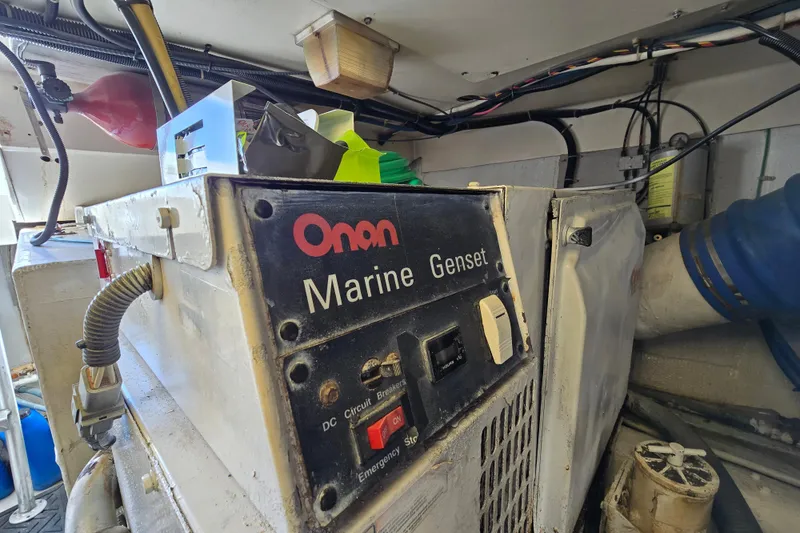 Slide: The Image of Onan Marine Genset in 1993 Ocean Yachts 53 Super Sport engine room. - 38