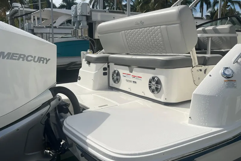 Slide: The Image of 2021 Sea Ray SDX 250 Outboard boat with Mercury engine, featuring luxurious seating. - 15