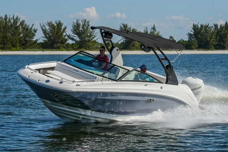 Slide: The Image of Manufacturer Provided Image: 2021 Sea Ray SDX 250 Outboard cruising on a sunny day. - 2