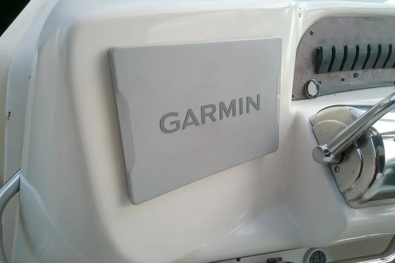 Slide: The Image of Garmin navigation system on 1998 Sea Ray Sundancer 330 boat dashboard. - 17