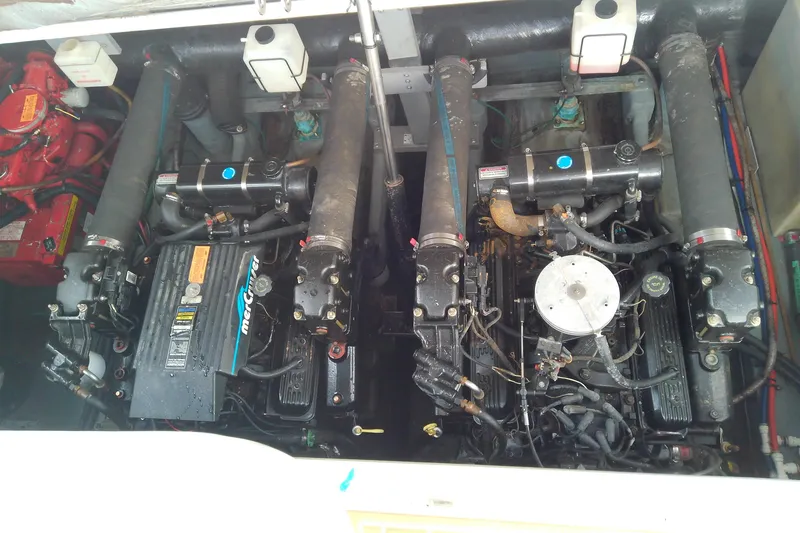 Slide: The Image of Engine compartment of a 1998 Sea Ray Sundancer 330, featuring dual MerCruiser engines. - 37