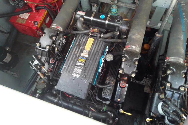 Slide: The Image of Engine compartment of a 1998 Sea Ray Sundancer 330 with MerCruiser components. - 38