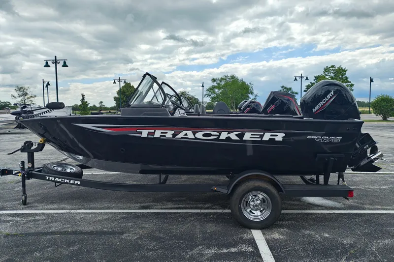 The Image of 2026 Tracker Pro Guide V-175 WT boat on trailer in parking lot. - 0