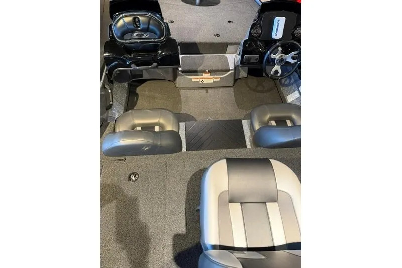 Slide: The Image of Interior of 2026 Nitro Z17 boat with gray seating and steering console. - 12
