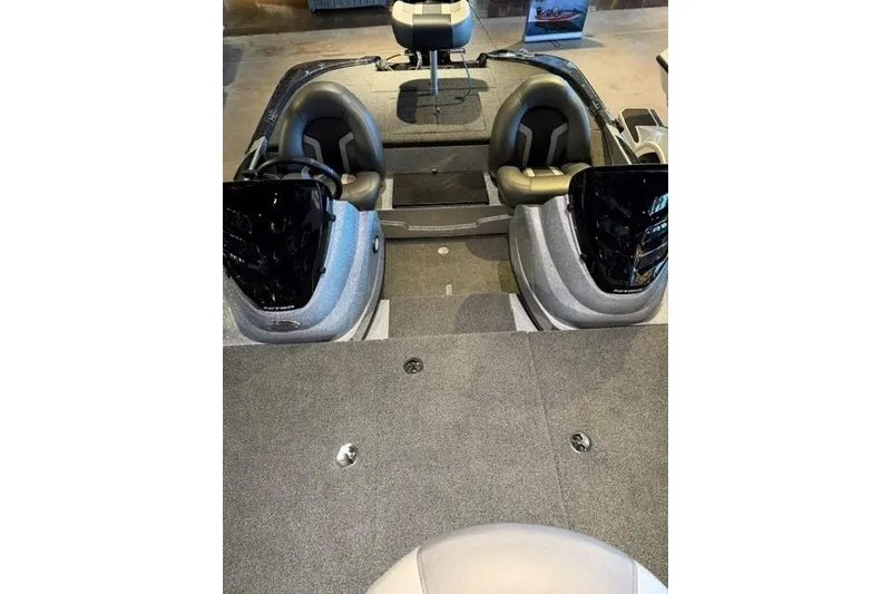 Slide: The Image of 2026 Nitro Z17 boat interior with dual seats and steering console. - 9