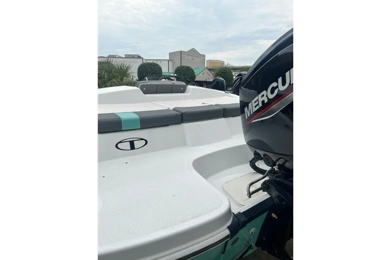 Slide: The Image of 2026 Tahoe T16 boat with Mercury engine, featuring sleek design and comfortable seating. - 3