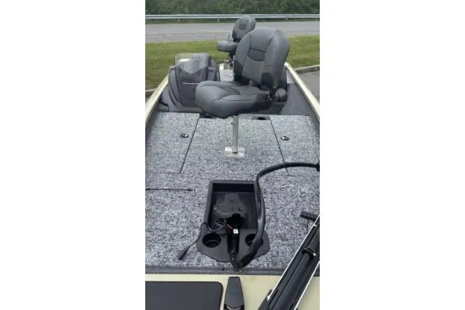 Slide: The Image of 2026 Tracker Pro Team 175 boat interior with seating and storage compartments. - 4