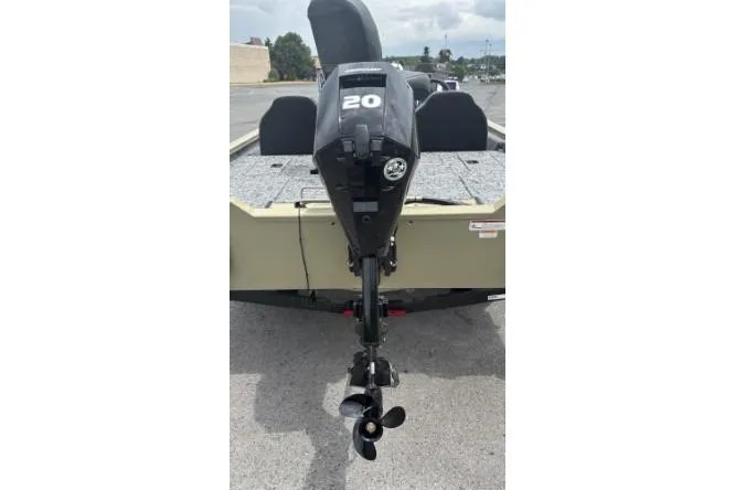 Slide: The Image of 2026 Tracker Pro Team 175 boat with a 20 HP outboard motor, rear view. - 2