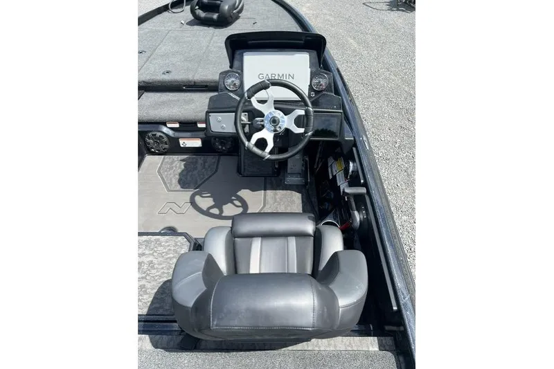 Slide: The Image of 2026 Nitro Z21 XL Pro boat cockpit with Garmin navigation and sleek seating. - 103