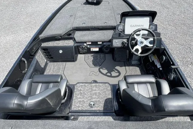 Slide: The Image of 2026 Nitro Z21 XL Pro boat interior with Garmin navigation system and dual seating. - 104