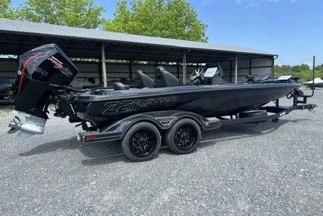 Slide: The Image of 2026 Nitro Z21 XL Pro boat on trailer, parked outdoors. - 106