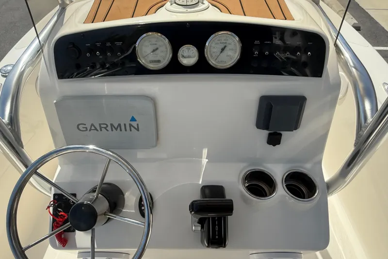 Slide: The Image of Steering console of 2022 Pioneer 180 Sportfish boat with Garmin navigation system. - 6