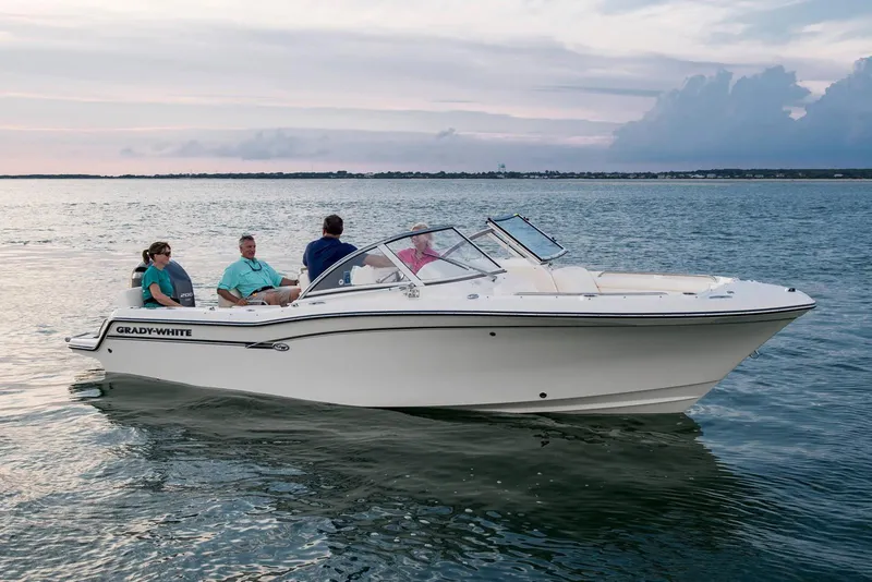 Slide: The Image of Manufacturer Provided Image: 2019 Grady-White Freedom 215 boat cruising with passengers on calm water. - 13