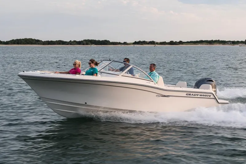 Slide: The Image of Manufacturer Provided Image: 2019 Grady-White Freedom 215 boat cruising on water with passengers. - 14
