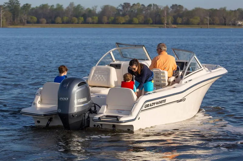 Slide: The Image of Manufacturer Provided Image: 2019 Grady-White Freedom 215 boat on water with family onboard. - 18
