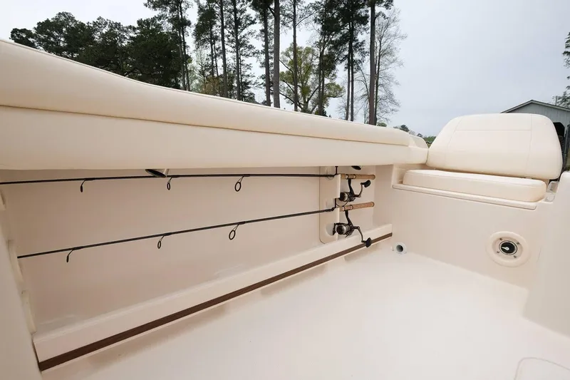 Slide: The Image of Manufacturer Provided Image: 2019 Grady-White Freedom 215 boat interior with rod holders and seating. - 22