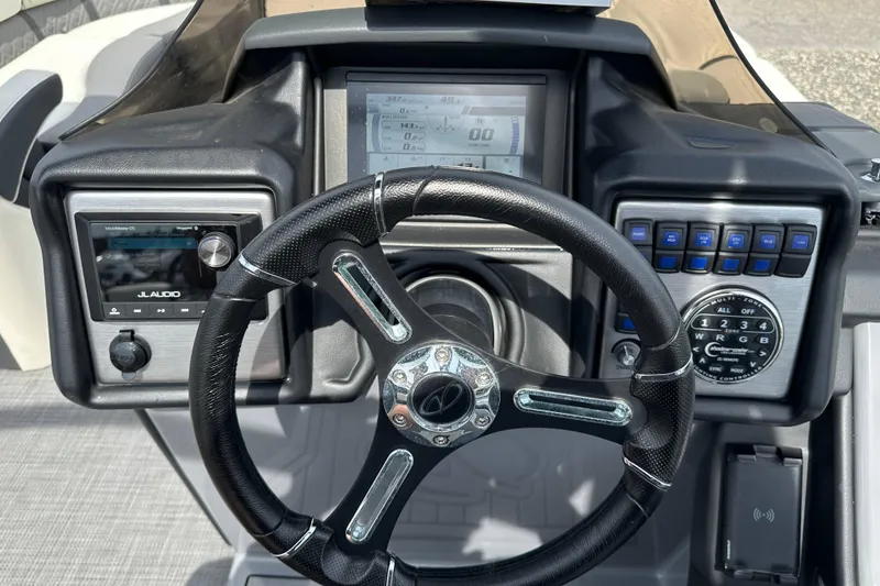 Slide: The Image of Steering console of 2024 Veranda VP25RCT with JL Audio system and control panel. - 20