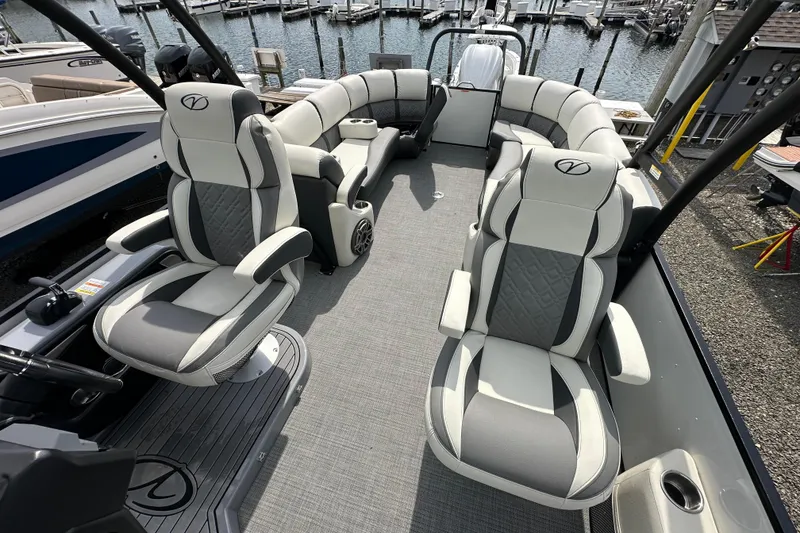 Slide: The Image of 2024 Veranda VP25RCT pontoon boat interior with luxurious seating and modern design. - 23